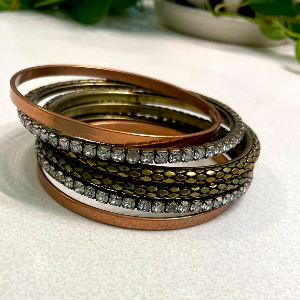6 bangle bracelets, 2 diamond style, 2 copper and 2 gold and black design